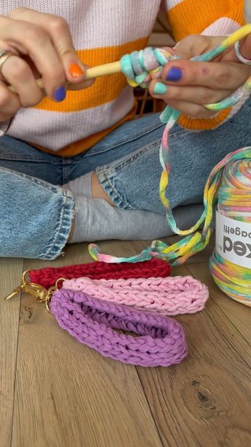 hejSWEDi on Instagram: "Crochet with me and with @hoooked.zpagetti these cute keychains 💜 #zpagettiyarn #hoookedzpagetti #keychains #coloful #handmade #crochetaddict #crochetlove #crochetinspiration #crocheting #crochetproject #reel #diycrafts #keychainhandmade #etsy #etsyshop #etsyhandmade #" Crochet Hook Keychain, How To Make Crochet Hook Handle, Zpagetti Crochet, Diy Clay Crochet Hook Handles, Crochet Hook Clay Handles, Crochet With Me, Cute Keychains, Steel Crochet Hooks, Etsy Handmade