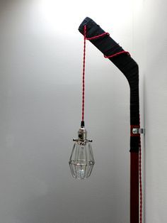 Vintage Hockey Stick Cage Light red cloth twisted by OVERSPRAYkc Hockey Couple, Hockey Stick Furniture, Aesthetic Hockey, Hockey Diy, Wall Lamps Diy, Hockey Crafts, Hockey Aesthetic, Hockey Bedroom, Hockey Girlfriend