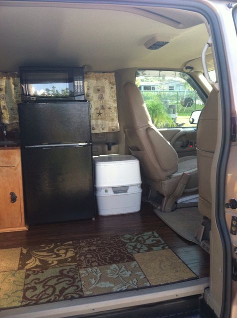 Custom RV Camper Van Stealth Conversion Van we built to be totally off grid with solar power and 25G freshwater tank. Built into a 2005 Chevrolet Astro Van by my husband and I. Fridge and freezer combo is powered by solar power, as well as the microwave. Porta Potti is self contained and easy to empty and clean. Astro Van Conversion, Astro Van Camper, Honda Pilot Camping Conversion, Chevy Astro Van Conversion, Chevy Van G20 Camper Interior, Chevy Astro Van Camper, Chevy Astro Camper, Dometic Fridge Van, Cargo Van Conversion