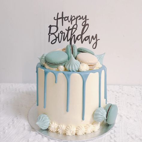 Pastel Blue Drip Meringue Cake- A minimalist pastel blue macarons drip cake topped with meringue and swirls for your birthday celebration. Important Note:  All birthday cake toppers are not included. Kindly purchase it here. For cake care guidance, click here. Please note that there may be a slight variation for the de