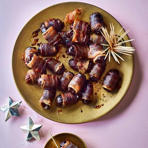 Nigella Lawson’s drunken devils on horseback recipe | Christmas food and drink | The Guardian Christmas Party Recipes, Blue Cheese Appetizers, Devils On Horseback, Nigella Christmas, Onion Bhajis, Baked Onion, Cheese Recipes Appetizers, Dried Prunes, Nigella Lawson