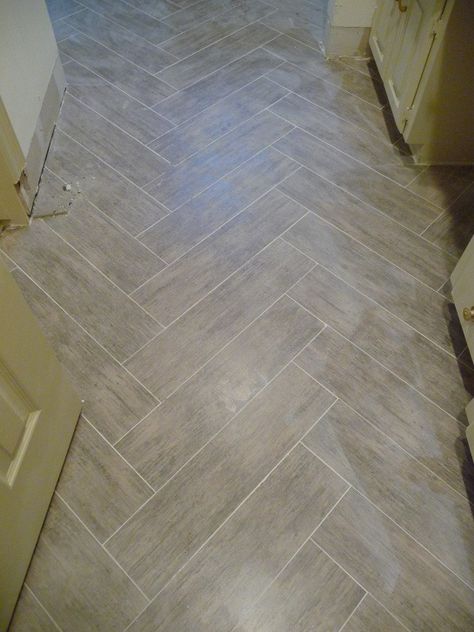 bathroom/laundry room Love the tiles laid in herringbone pattern Porcelain Wood Tile Bathroom, Faux Wood Tiles, Wood Tile Bathroom, Wood Plank Tile, Porcelain Wood Tile, Herringbone Wood, Missing Person, Ceramic Floor Tile, Living Room Tiles