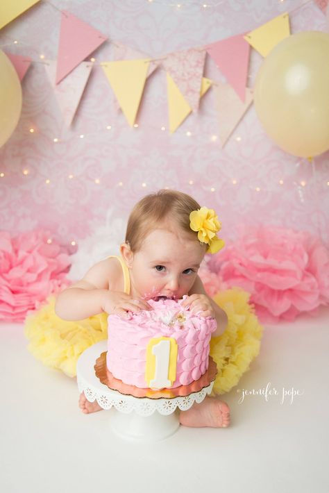 pink & yellow cake smash Sunshine 1st Birthday Photoshoot, Pink And Yellow Smash Cake, Sunshine First Birthday Photoshoot, Sunshine Smash Cake, Yellow Cake Smash, Sunshine Cake Smash, Baby Reflexology, Rubber Ducky Birthday, Sunshine Theme