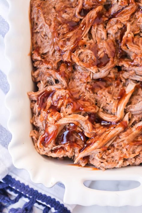 This classic barbecue pulled pork recipe is about to amplify your kitchen game. With a few simple ingredients tossed into the Crock Pot, you'll have smoky, indulgent BBQ Pork Tenderloin in just about 4 hours--or less! #BBQpulledpork #pulledpork #BBQpork #BBQ #barbecuepulledpork #slowcookerpulledpork #crockpotpullerpork Pulled Pork Tenderloin Slow Cooker, Best Slow Cooker Pulled Pork, Barbecue Pork Roast, Barbecue Pork Tenderloin, Pork Loin Pulled Pork, Pulled Pork Tenderloin, Bbq Pork Roast, Barbecue Pulled Pork Recipe, Crockpot Pork Loin