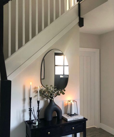 Black Hallway Decor, Earthy Hallway Decor, Black Mirror Hallway, Black Hallway Mirror, Hallway With Black Round Mirror, Black And Beige Entryway, Neutral And Black Hallway, Mirror Hallway Entrance, Beige And Black Hallway Ideas