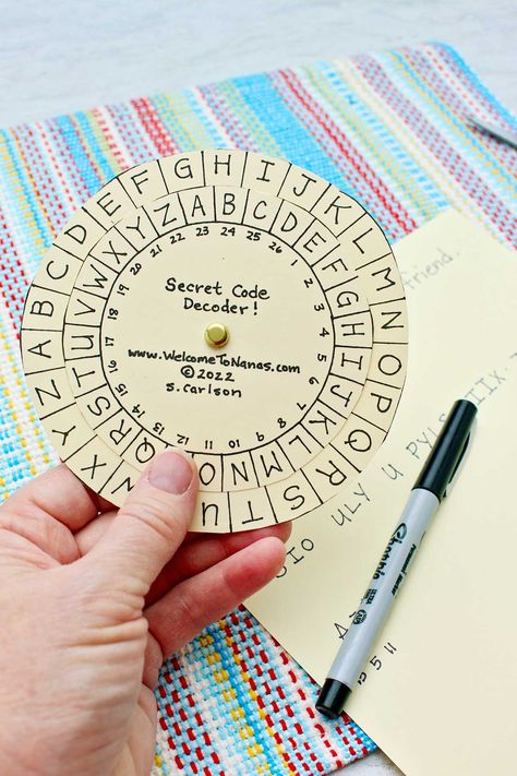 Kids can make their own DIY secret spy decoder wheel for writing and decoding secret messages. Use the free printable and make a secret code! #WelcometoNanas #MessageDecoder #DIYDecoderWheel #SecretMessageDecoder Spy Decoder Wheel Printable, Diy Decoder Wheel, Secret Agent Badge Printable Free, Secret Messages Code, Secret Message Origami, Diy Spy Kit, Secret Message Ideas, Game Pieces Diy, Homemade Escape Room