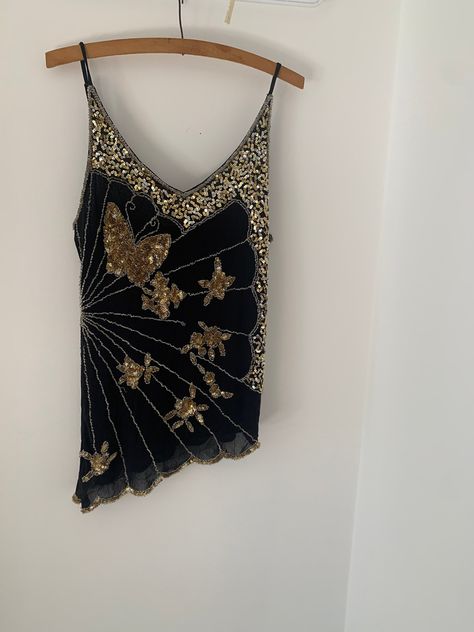 STUNNING vintage 00s sequinned singlet top. This beauty is form-fitting but flattering, with an asymmetric hemline and super dainty and precise sequins and beading in a butterfly print.  Perfect for a flapper themed party or just to feel fancy. SIZE Best fit AU 10-12 Beaded Tops Blouses, Vintage Sequin Top, Thrift List, Fancy Tank Tops, Dream Items, Beaded Work, Thrift Haul, Singlet Tops, Womens Blouses