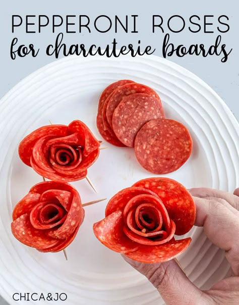 Easily make pepperoni roses to include in a charcuterie board. How To Make Roses Out Of Pepperoni, Kentucky Charcuterie Board, Rose Out Of Pepperoni, Pepperoni For Charcuterie, How To Make A Rose Out Of Pepperoni, Pepperoni And Cheese Charcuterie Board, Charcuterie Board Pepperoni Rose, Charcuterie Pepperoni Rose, How To Make Charcuterie Roses