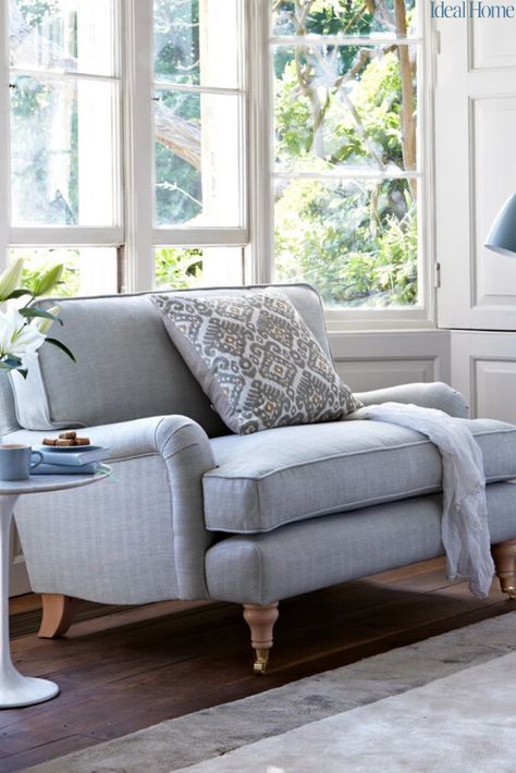 Sink-into seating for small-scale spaces. We've picked the best of this season's love seats, snugglers and small but perfectly formed sofas. All offer compact and super comfy options for bijou country living rooms. #smalllivingrooms #smalllivingroomideas #seatingforsmalllivingrooms #howtomaximisespaceinasmalllivingroom Grey Window Seat, Bay Window Seat Ideas, Bay Window Seating, Bay Window Decor, Bay Window Benches, Bay Window Design, English Townhouse, Bay Window Living Room, Window Seating