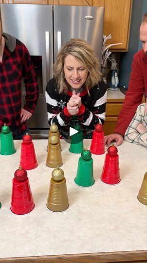 362K views · 1.2K comments | What's Under the Cup -- Family Game 🥤 | What's Under the Cup -- Family Game 🥤 Mom, Dad, and family play a fun Christmas cup roulette with some awesome prizes. Fun idea for Holiday gatherings.... | By Peter B | Facebook Whats Under The Cup Game, Solo Cup Games With Prizes, Solo Cup Games For Adults, Christmas Punch Cups Game, Cups Games For Adults, Ball In The Cup Game, Christmas Games With Prizes, Christmas Prize Games, Christmas Cup Games For Family