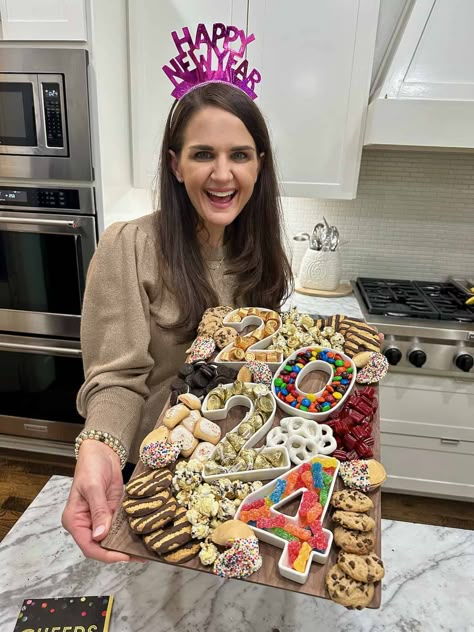 Maegan holding a dessert board for 2024. Nye Party Food, Nye Desserts, Almond Champagne, Buffet Setup, Candy Charcuterie, New Years Eve Dessert, Fudge Stripe Cookies, Cookie Platters, Moon Cookies