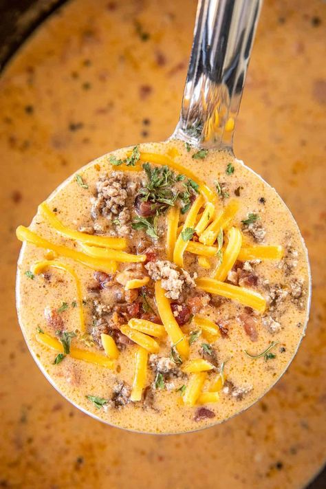 Slow Cooker Low-Carb Bacon Cheeseburger Soup - SO good! I wanted to lick the bowl!! Even if you aren't doing a low-carb/keto diet you are going to LOVE this soup. Ground beef, bacon, hamburger seasoning, Ranch dressing mix, Rotel, cream cheese, cheddar cheese, and beef broth. Just dump every in the crockpot and dinner is done. Can freeze leftovers for a quick meal later. This soup is seriously delicious!! #crockpot #slowcooker #soup #bacon #lowcarb #keto Crockpot Cheeseburger Soup, Crockpot Cheeseburger, Soup Bacon, Cheeseburger Soup Crockpot, Freeze Leftovers, Soup Low Carb, Jalapeno Bacon, Hamburger Seasoning, Bacon Cheeseburger Soup