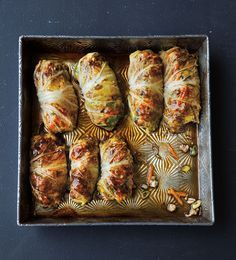 Asian-Style Cabbage Rolls: Ingredients ― oil; sesame oil; fresh ginger; garlic; shiitakes; ground pork; cooked brown rice; carrot; scallions; cilantro; red pepper flakes; soy sauce; rice vinegar; napa cabbage; hoisin sauce. Instructions ― Sauté ginger, garlic and mushrooms; cool; add pork, rice, carrot, scallions, cilantro, pepper flakes & soy sauce; sprinkle with vinegar; mix until well combined. Stuff & roll cabbage leaves; combine hoisin sauce & vinegar; brush; bake. Serve. #Cabbage_Rolls Cabbage Rolls Recipe, Napa Cabbage, Cabbage Rolls, Think Food, Asian Flavors, Cabbage Recipes, Hoisin Sauce, Asian Cooking, Asian Dishes