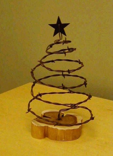 Rustic Barb-Wire X'Mas Tree on Cedar base $15.00 plus shipping, to order contact woodcrafterswisdom@gmail.com Barb Wire Crafts Diy, Barb Wire Christmas Tree, Barbed Wire Christmas Tree, Old Barb Wire Ideas, Barbed Wire Crafts, Barbed Wire Christmas, Barbwire Crafts, Barbed Wire Decor, Barb Wire Crafts