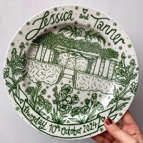 This custom green wedding plate is for @jessquiz ✨💗 thank you so much for such beautiful inspiration to create your plate! ✨💗🏠 A custom green illustration on a 27cm rimmed plate which has successfully been delivered in one piece to the USA! ✨💚 Commissions are open🤍✨⭐️ #art #artist #ceramics #pottery #painting #illustrator #ceramicstudio #potterytiktok #potterypainting #painter #potteryart #ceramicpainter #floral #bisqueware #weddinginspiration #creative #smallbusiness #smallbusinessowner ... Painted Pottery Serving Tray, Wedding Plate Painting Ideas, Painted Plates Diy, Wedding Platters, Wedding Plate, Green Illustration, Hand Painted Plate, Pottery Inspo, Color Me Mine