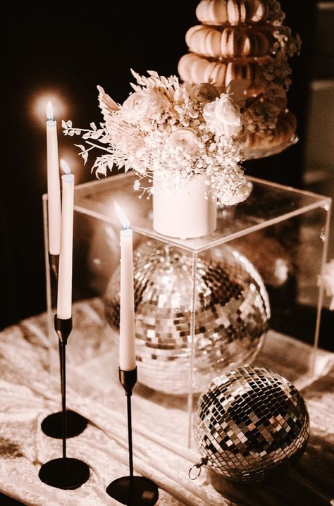 Time to get the party started! ⫸ We're channeling dancing vibes with the disco balls and sparkling champagne as we prepare for the weekend. ⫷ Take a little scroll through our Feed to learn more of what we're about! Design/Planning/Florals/Rentals/Graphic Design/Venue: AZ + Co. Photographer: Britt McNeil Photography • • • #azandco #azevents #azdesign #azflorals #azrentals #azvenue #eventplanner #nebraskaeventplanner #nebraskaweddingplanner #midwesteventcoordinator Disco Ball Sweetheart Table, Desert Disco, Serenity Garden, Wedding Swag, Nebraska Wedding, Disco Balls, Event Coordinator, Get The Party Started, Sweetheart Table