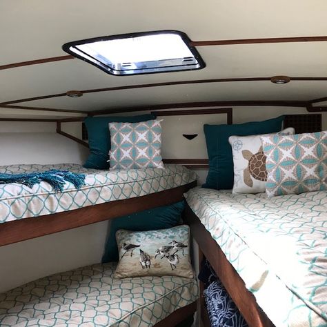 What a fun, tidy and nautical look! This Bertram 46 1974 has been reconfigured to maximize sleeping quarters. We used Sunbrella Accord Jade for the coverlets. . . . #coverlets #bedding #yacht #boats #bertram #bertramboats #interiors #beds Bertram Boats, Boat Bedding, Boat Bed, Sport Fishing Boats, Sleeping Quarters, Nautical Looks, Scroll Pattern, Yacht Boat, Canopy Bed