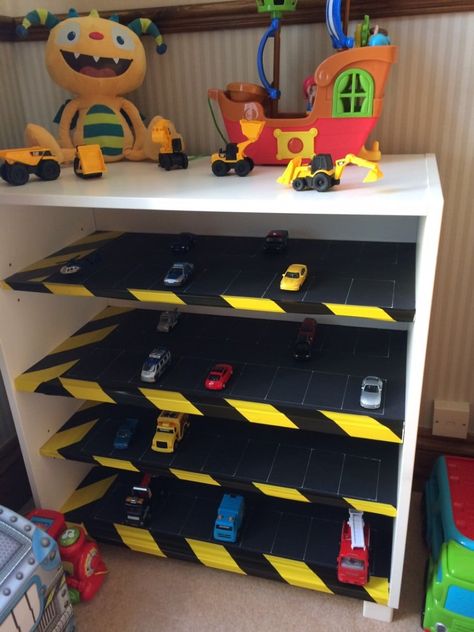 Sonny boy loves the toy car park and I don't trip over tiny cars in the kitchen anymore! Hot Wheels Display Case, Toy Car Garage, Toy Car Storage, Hot Wheels Display, Diy Kids Furniture, Toy Garage, Sonny Boy, Boys Playroom, Cars Room