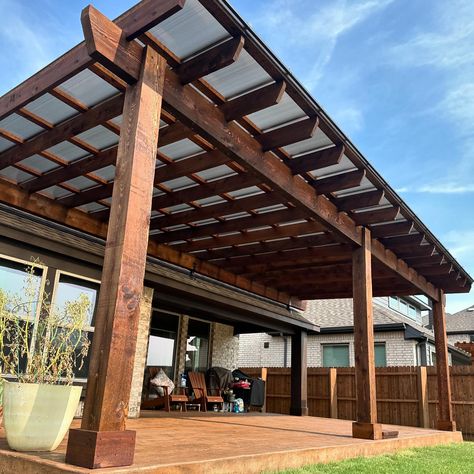 I just finished up this SkyPoly Pergola in Ponder. 28x14. 8x8 posts. 4x12 header. 2x8 joists. 2x4 slats. We lifted off the roof with the SkyLift Roof Risers. We installed the SkyPoly roof. Notched joists. 2’ overhang. We also did the stamped concrete wood texture under the pergola. Text me Chad the tall goofy guy if you want a pergola. 972-342-1645 #pergola #patiocover #pergoladesign #patiodesign #outdoorlivingspace #outdoorlivingroom Backyard Pergola With Roof, Skypoly Pergola, Deck Cover, Outdoor Living Deck, House Light, House Deco, Backyard Pergola, Pergola With Roof, Concrete Wood