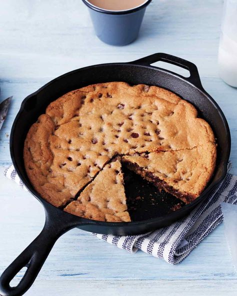 Chocolate chip skillet cookie... 2 bags Betty Crocker choc. Chip cookie mix, 2 eggs, 2 sticks butter, optional walnuts. Mix, press into greased 10" cast iron pan. Bake at 350 for 35 min. Let rest 10-15 min. Serve with or w/o vanilla ice cream... Yum!!! Skillet Chocolate Chip Cookie, Popular Cookies, Iron Skillet Recipes, Chocolate Chip Cookie Cake, Skillet Cookie, Cast Iron Skillet Recipes, Chewy Chocolate Chip, Skillet Meals, Cast Iron Skillet