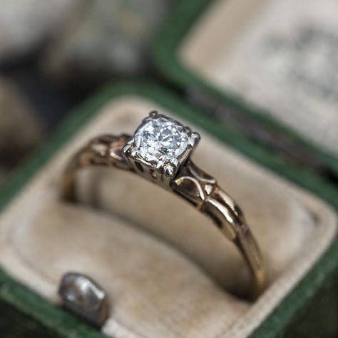 This pretty circa 1940s vintage engagement ring contains one (1) round transitional brilliant cut diamond bead set into a illusion style setting. The shoulders of the ring feature a pierced design. The ring measures 5.1mm at the top, rises 5.5mm above the finger, tapering to 1.1mm wide and 1.2mm thick at the base of the shank. Currently, it fits a size 7. Ring Upgrade, Vintage Engagement Ring, Antique Diamond Rings, Engagement Style, Bead Set, Antique Engagement, Antique Engagement Rings, Antique Diamond, Vintage Engagement