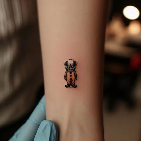 78 Sensational Clown Tattoo Ideas With Two-Ended Meanings! – Tattoo Inspired Apparel Tiny Clown Tattoo, Childs Play Tattoo, Clown Tattoo Simple, Female Clown Tattoo, Clown Tattoo Ideas, Traditional Clown Tattoo, Clown Face Tattoo, Clown Tattoos, Evil Clown Tattoos