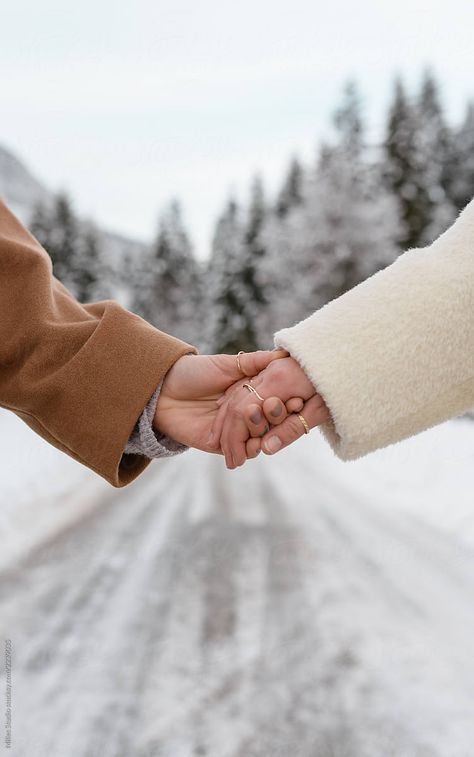 Crop women holding hands in winter snow by Milles Studio for Stocksy United Couple Photos In Snow, Winter Snow Couple Pictures, Christmas Love Couple, Snowy Couple Pictures, Snowy Winter Couple Pictures, Winter Couple Pictures, Snowfall Couple Photography, Couple Photography Winter, Winter Engagement Photos Outfits