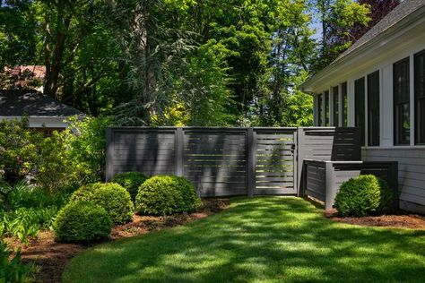 A dark gray fence is a bold backdrop for a gallery of sculptural plants, which becomes increasingly more lush as the backyard recedes.

#Offshoots #KateKennen #PHYTO #Phytoremediation #LandscapeArchitecture #Garden #Residential

Location: Newton, MA Dark Green Fence Garden, Dark Privacy Fence, Gray Fence Backyard, Gray Fence Ideas, Black Painted Fence, Dark Gray Fence, Black Fence Backyard, Backyard Bushes, Dark Grey Fence