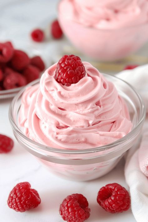 Once you've experienced the joy of raspberry whipped cream, you'll never settle for plain whipped cream again. It's pure magic, and I know you'll love it. Whipped Raspberry Frosting, Raspberries And Cream, Raspberry Whipped Cream Frosting, Fresh Whipped Cream Recipe, Cherry Whipped Cream, Raspberry Cream Filling, Raspberry Pudding, Raspberry Whip, Raspberry Whipped Cream