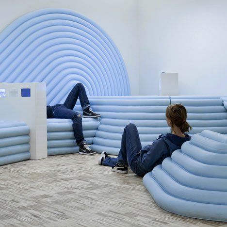 A room where teenagers can hang out designed by Mathieu Lehanneur has opened at the Centre Pompidou in Paris. Called Studio 13/16, the interior features a twisting lighting and electrical track suspended from the ceiling, which can be used for filming, installing displays and suspending screens. Blue ribbed seating forms a landscape to relax on, punctuated Mathieu Lehanneur, Centre Pompidou, Boutique Interior, Design Del Prodotto, Teen Room, Kid Spaces, Retail Design, Exhibition Design, 인테리어 디자인