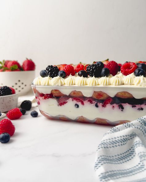 ✨NEW✨ Berry Chantilly Tiramisu Layers of delicate raspberry-soaked ladyfingers, almond-infused mascarpone frosting, and fresh mixed berries. It’s light, creamy, and a sweet summer twist on the classic Italian dessert! 🤍 ✨Recipe is on my website and linked in my profile! #chantilly #berrychantillycake #tiramisu #summerdessert #4thofjulyfood Berry Tiramisu, Berry Chantilly Cake, Crunch Cookies, Cake In A Cone, Mascarpone Frosting, Italian Dessert, Delicious Appetizer Recipes, Cookie Spread, Tiramisu Recipe