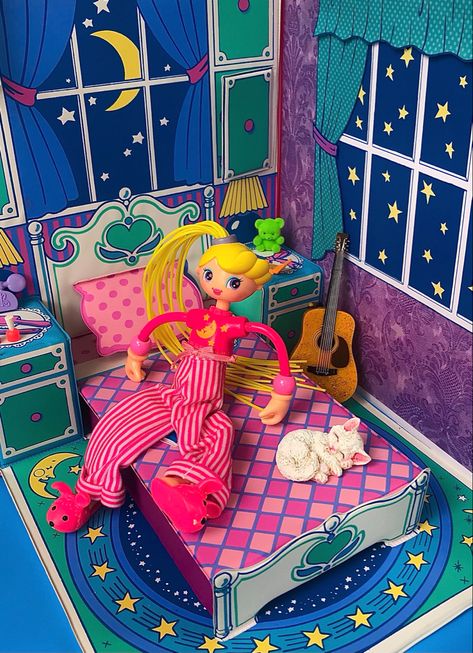 Vintage Betty spaghetti doll wearing pajamas and sitting on a vintage pink doll bed with a moon shining through the window. Betty Spaghetti Doll, Betty Spaghetti, Betty Spaghetty, Make The Bed, Inner Child Healing, 2000s Nostalgia, Im A Barbie Girl, Night Stands, Retro Toys