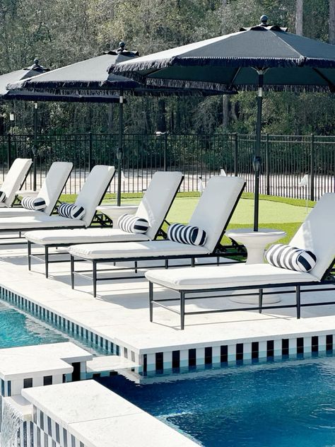 Summer is right around the corner therefore I am sharing a round up of chaise lounge chairs pool side. Our chairs are discontinued, but I found similar styles that go with the black and white theme. Black And White Pool Decor, Pool Black And White, Black And White Pool, Southern Backyard, Pool Patio Furniture, Backyard Pool Ideas, Black And White Chair, Outdoor Pool Area, Pool Lounge Chairs