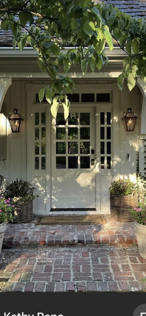 English Cottage Brick Exterior, Arched Cottage Door, East Coast Cottage Exterior, Cottagecore Brick House, Coquette Cottage Exterior, Custom Exterior Doors, Cottage Patio, Dutch Door, Cottage Exterior