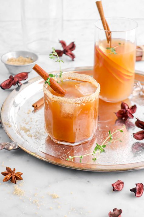 If Fall were a cocktail, it would be this Apple Cider Bourbon Thyme Smash! Every sip is perfectly sweet, full of apple and cinnamon flavor, with just a touch of bourbon. Simply a must-have during the holiday's! Spiked Caramel Apple Cider, Spiked Apple Cider Recipe, Cider Drink Recipes, Caramel Apple Cider Recipe, Slow Cooker Drinks, Cider Cocktail Recipes, Caramel Apple Cider, Apple Cider Drink, Spiked Apple Cider