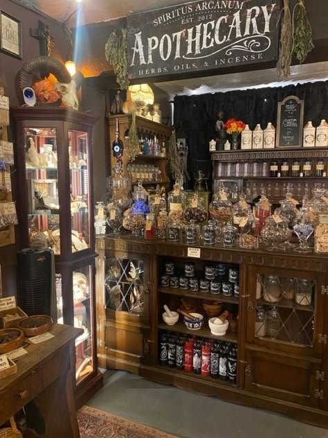 Herbalist Home Decor, Witch Shop Exterior, Witch Apothecary Halloween Decor, Gothic Apothecary Aesthetic, Apothecary Pictures, Witchy Coffee Bar Ideas, Medieval Apothecary Aesthetic, Curio Shop Aesthetic, Dark Academia Apothecary