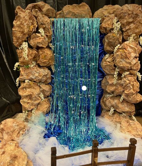 Enchanted Forest Prom Decorations Diy, Fake Waterfall Decoration, Fake Waterfall Diy, Waterfall Decoration Ideas, Waterfall Set Design, Enchanted Forest Parade Float, Fairytale Decorations Enchanted Forest, Waterfall Diy Decoration, Enchanted Forest Props