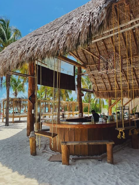 Cute bar with swing-sets at Playa del Norte in Isla Mujeres, Mexico 🤍 Tiki Bar Restaurant Ideas, Island Restaurant Design, Beach Bar Ideas, Beach Cafe Design, Beach Bar Design Ideas, Beach Restaurant Design, Billiards Bar, Outdoor Restaurant Patio, Tiki Bar Decor