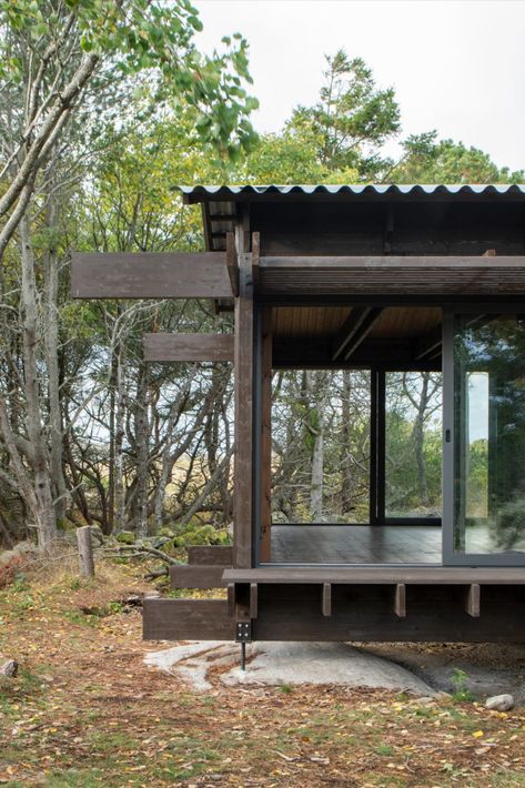 HelgessonGonzaga has created a dark timber cabin in Tjurpannan. Shed Roof Cabin, Wooden Ramp, Timber Cabin, Sweden House, Wooden Terrace, Prefab Cabins, Dark Wood Stain, Wood Cladding, Vernacular Architecture