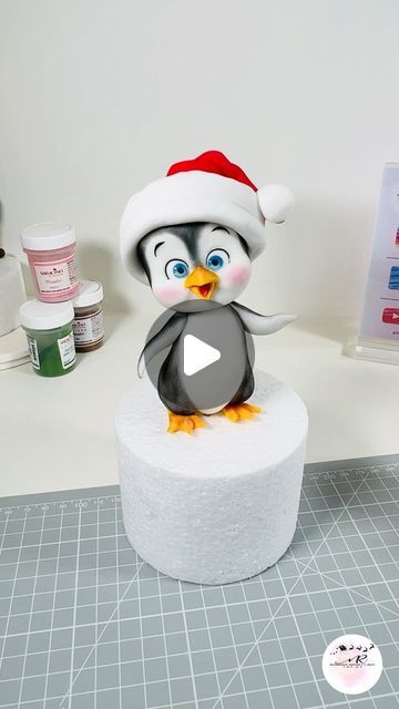 Saracino on Instagram: "🎄🐧 Make Your Cake Extra Special This Christmas with a Penguin Topper! 🐧🎄

Follow Romina’s technique and create a charming little penguin to sit proudly on top of your holiday bakes. Using Saracino’s smooth, easy-to-work-with Pasta Model, you can sculpt this adorable penguin with perfect details! 🌟✨

Are you ready to spread some Christmas cheer with your cakes? Let’s get decorating! 🌟

👉 Don’t forget to save for later and try this festive penguin topper on your next Christmas cake! 🎂🎉

🇮🇹✨✨✨🇮🇹

🎄🐧 Rendi la tua torta ancora più speciale questo Natale con una decorazione in zucchero a forma di pinguino! 🐧🎄
 
Segui la tecnica di Romina e crea un affascinante piccolo pinguino da posizionare con orgoglio sopra i tuoi dolci natalizi. Usando la Pasta Model Penguin Fondant Tutorial, Penguin Fondant, Fondant Penguin, Polymer Clay Snowman, Holiday Bakes, Penguin Cake Toppers, Penguin Cake, Santa Cake, Penguin Cakes