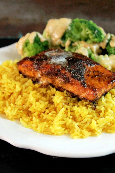 It’s time for some wonderful tasty seafood people! I decided to cook Blackened Salmon with Yellow Rice, and Broccoli with Gorgonzola Cream Sauce! Yep, I am getting fancy folks! Salmon is my favorite fish! I could really eat salmon everyday and there has been times when I’ve made salmon daily for a week straight. Yep, … Salmon With Yellow Rice, Salmon Brown Rice Recipes, Cajun Butter Salmon And Rice, Salmon And Brown Rice, Salmon And Rice Aesthetic, Recipes For Fish, Blackened Redfish, Gorgonzola Cream Sauce, Yellow Rice Recipes