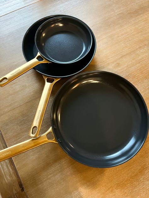 They come in lots of colors! Prettiest Frying Pans - Luxury Kitchen Accessories - Black and Gold Kitchen - Dream Kitchen - ceramic frying pans - black and gold pots and pans - ceramic pots and pans - pretty kitchen - aesthetic kitchen Pots And Pans Aesthetic, Aesthetic Pots And Pans, Black Pots And Pans, Gold Pots And Pans, Frying Pan Aesthetic, Black And Gold Kitchen, Chicago Kitchen, Black Pot And Pan Set, Omelette Pan