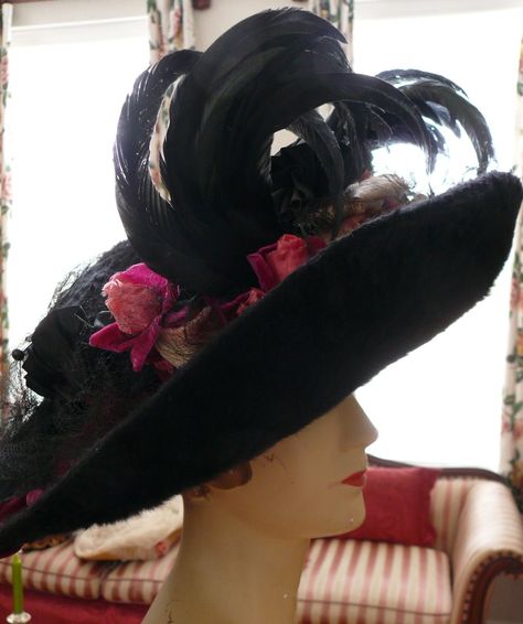 VICTORIAN HAT 1890-1900 X-tra Large Black Beaver Fascinator This hat was purchased in France 20 years ago and has been in my collection since. Absolutely stunning romantic ethereal, victorian hat, it is large and has greenish black stand up feathers , what a show off piece . Burgundy red velvet, black taffeta rushing and pink silk and red velvet flowers adorn this stunner. Silk netting and a 6 inch hatpin with a black glass ball finish of... Junk Kouture, Beaded Gloves, Beaver Hat, Edwardian Hat, Victorian Hats, Hat Stand, Velvet Flowers, Wonderful Picture, Vintage Type