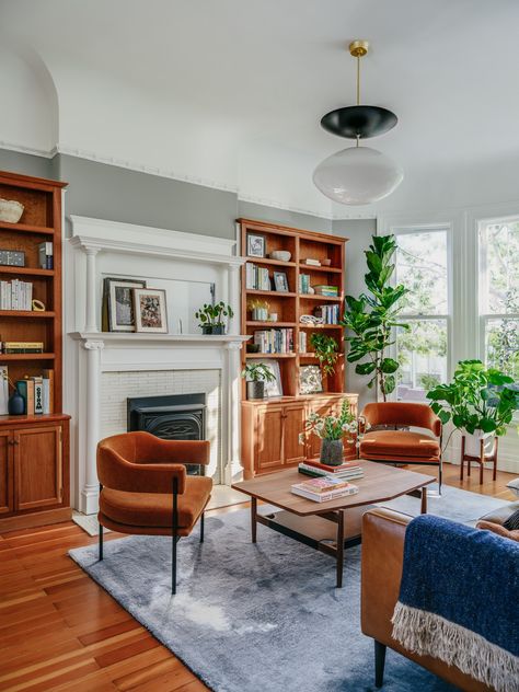 Blue Orange And Green Living Room, Living Room Architectural Digest, Midcentury Modern Traditional, Victorian Home Inspiration, Architectural Digest Apartment, Mcm Mixed With Traditional, Mcm Meets Victorian, Victorian House Living Room Ideas, Mid Century Victorian Living Room