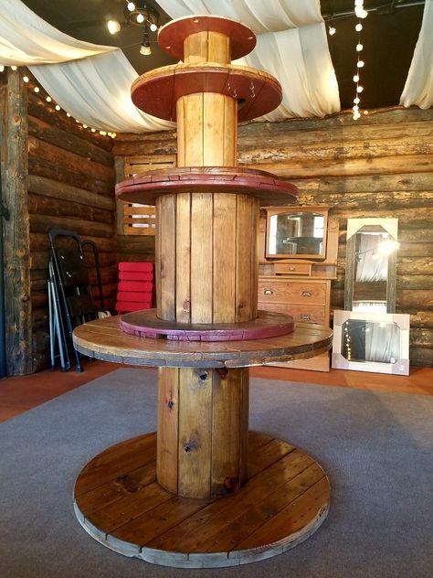 Cable spools I sanded, stained, and stacked for a local gift boutique. Wooden Spool Display, Wooden Spool Ideas, Large Wooden Spools, Wooden Cable Spools, Cable Spools, Flower Shop Display, Spool Ideas, Cable Spool, Wire Spool