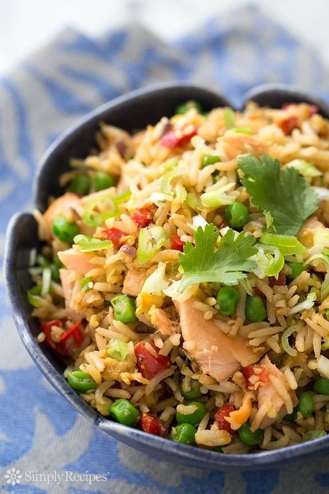 Salmon Fried Rice ~ Have leftover rice and cooked salmon? Make salmon fried rice! Comes together in minutes. Easy and so good! ~ SimplyRecipes.com Salmon Fried, Salmon Fried Rice, Canned Salmon Recipes, Cooked Salmon, Salmon Soy Sauce, Meal Options, Vegetable Rice, Salmon And Rice, Leftover Rice