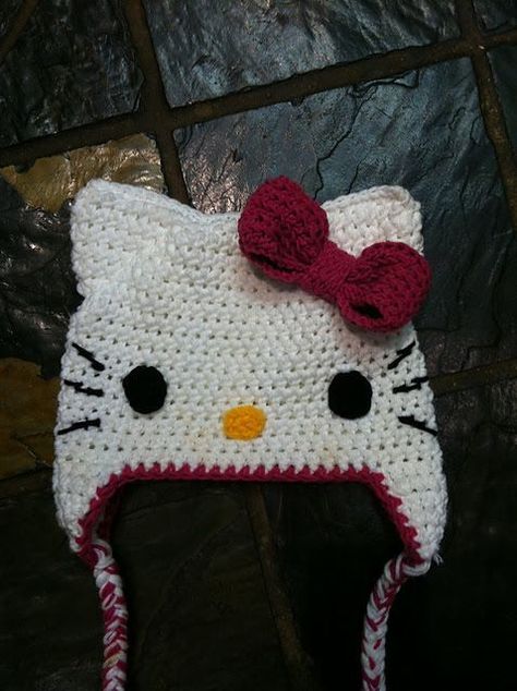 Craft Passions Hello Kitty Hat, Crochet Kitty, Crochet Cat Hat, Hello Kitty Crochet, Cat Apparel, Crochet Kids Hats, Hat Patterns Free, Crocheted Hats, Crochet Hat Free