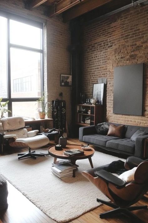 "Create a bold and stylish space with a Modern Industrial Living Room! 🛋️🏭 Perfect for combining raw materials and contemporary comfort. 🌟✨ #IndustrialLiving #ModernDecor #LivingRoomInspiration" Brown Industrial Living Room, Industrial Lounge Room, Black Industrial Living Room, Industrial Mcm Living Room, Bachelor Pad Decor Living Room, Masculine Studio Apartment, Male Living Room Ideas, Male Living Room, Cozy Masculine Living Room