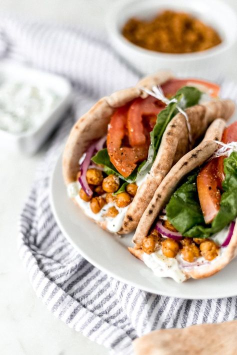 Spicy Chickpea Gyros is a simple and delicious Mediterranean inspired recipe that is full of flavor and contains a tasty tzatziki sauce. simplylakita.com #gyros #vegetarian Gyros Vegetarian, Vegetarian Gyro Recipe, Gyro Recipes, Chickpea Gyros, Flavored Chickpeas, Gyro Salad, Gyro Recipe, Spiced Chickpeas, Doner Kebab