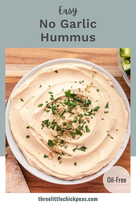 No garlic hummus in a bowl with spices and parsley on top. Hummus Recipe Without Garlic, Creamy Hummus Recipe, Garlic Hummus Recipe, Chickpea Dip, Vegan Appetizers Recipes, Creamy Hummus, Oil Free Vegan Recipes, Garlic Hummus, Vegan Snack Recipes